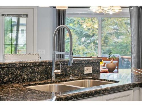 73 Weston Way Sw, Calgary, AB - Indoor Photo Showing Kitchen With Double Sink