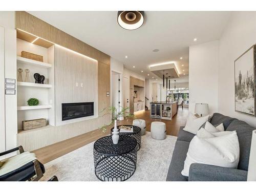 2433 6 Avenue Nw, Calgary, AB - Indoor Photo Showing Living Room With Fireplace