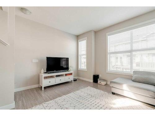 40 Legacy Path Se, Calgary, AB - Indoor Photo Showing Living Room