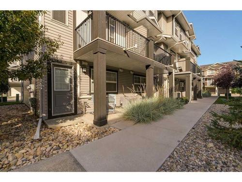 40 Legacy Path Se, Calgary, AB - Outdoor With Balcony With Facade