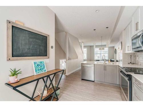 40 Legacy Path Se, Calgary, AB - Indoor Photo Showing Kitchen With Upgraded Kitchen