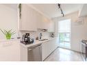 2426 210 Avenue Se, Calgary, AB  - Indoor Photo Showing Kitchen With Double Sink 