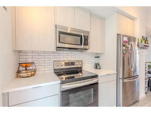 2426 210 Avenue Se, Calgary, AB - Indoor Photo Showing Kitchen With Stainless Steel Kitchen