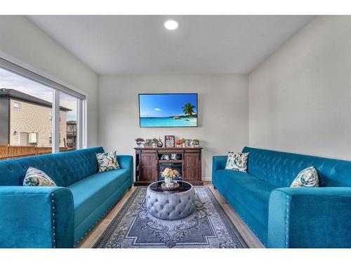 28 Savanna Link Ne, Calgary, AB - Indoor Photo Showing Living Room