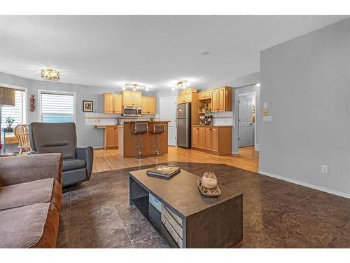 1093 Cranston Drive Se, Calgary, AB - Indoor Photo Showing Living Room