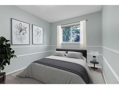 1093 Cranston Drive Se, Calgary, AB - Indoor Photo Showing Bedroom