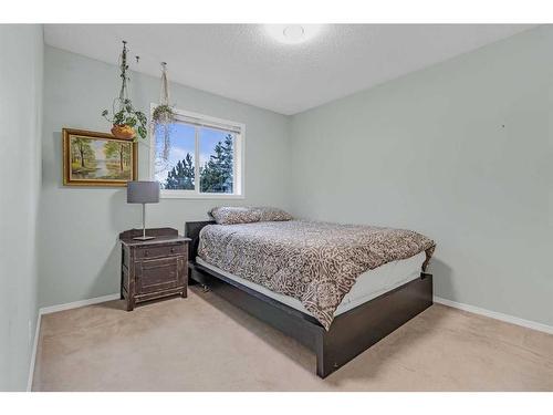 1093 Cranston Drive Se, Calgary, AB - Indoor Photo Showing Bedroom