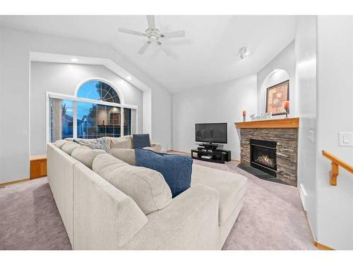 86 Cranfield Crescent Se, Calgary, AB - Indoor Photo Showing Living Room With Fireplace