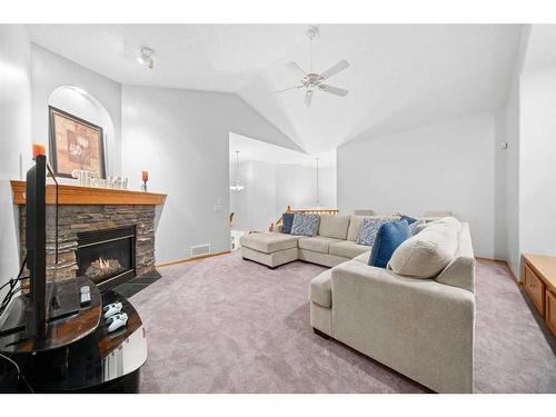 86 Cranfield Crescent Se, Calgary, AB - Indoor Photo Showing Living Room With Fireplace