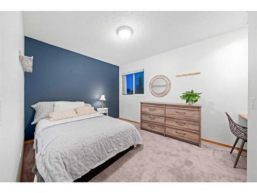 86 Cranfield Crescent Se, Calgary, AB - Indoor Photo Showing Bedroom