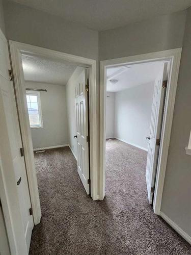 124 Windstone Link Sw, Airdrie, AB - Indoor Photo Showing Other Room