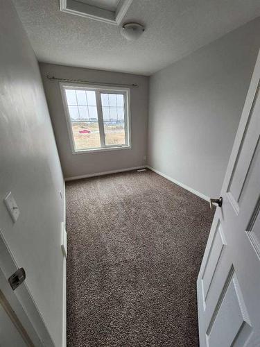 124 Windstone Link Sw, Airdrie, AB - Indoor Photo Showing Other Room