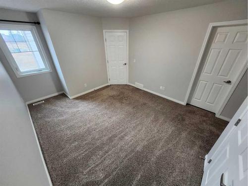 124 Windstone Link Sw, Airdrie, AB - Indoor Photo Showing Other Room