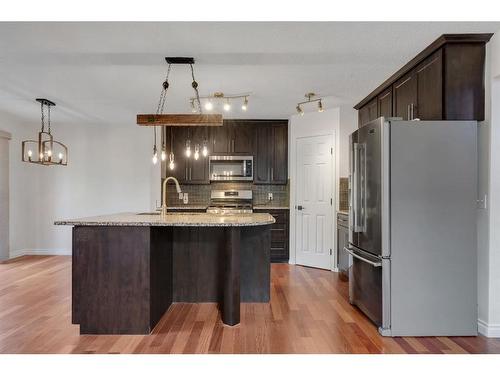 24 Tuscarora Place Nw, Calgary, AB - Indoor Photo Showing Kitchen With Upgraded Kitchen