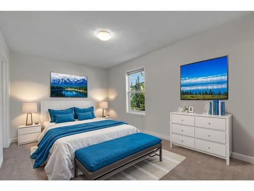 24 Tuscarora Place Nw, Calgary, AB - Indoor Photo Showing Bedroom