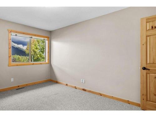 102-800 Wilson Way, Canmore, AB - Indoor Photo Showing Other Room