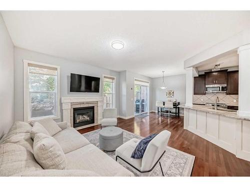 73 Cranleigh Heath Se, Calgary, AB - Indoor Photo Showing Living Room With Fireplace