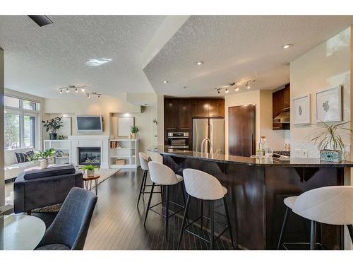 115-950 Centre Avenue Ne, Calgary, AB - Indoor With Fireplace