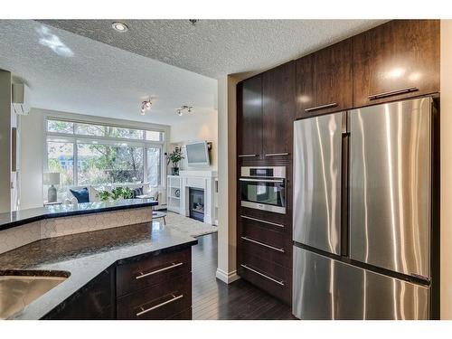 115-950 Centre Avenue Ne, Calgary, AB - Indoor Photo Showing Kitchen With Stainless Steel Kitchen