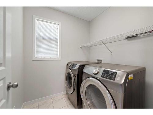 80 Copperpond Parade Se, Calgary, AB - Indoor Photo Showing Laundry Room