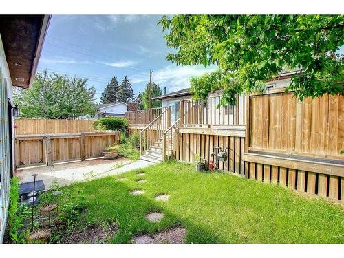 331 Huntridge Road Ne, Calgary, AB - Outdoor With Backyard