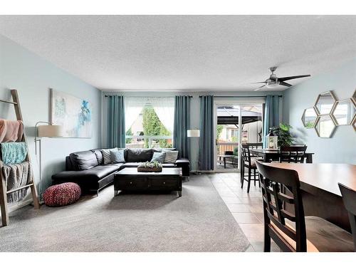 13 Brightoncrest Grove Se, Calgary, AB - Indoor Photo Showing Living Room