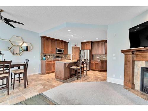 13 Brightoncrest Grove Se, Calgary, AB - Indoor With Fireplace