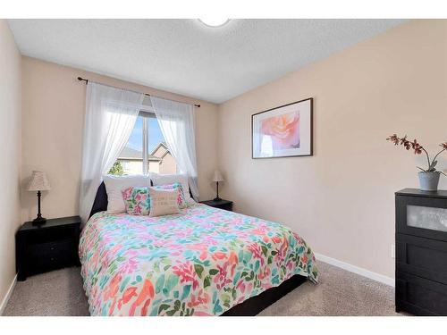 13 Brightoncrest Grove Se, Calgary, AB - Indoor Photo Showing Bedroom