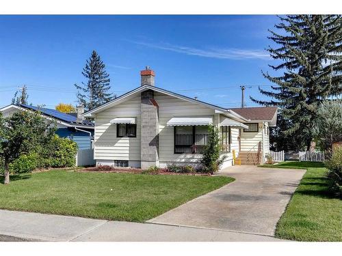 48 Malibou Road Sw, Calgary, AB - Outdoor With Facade