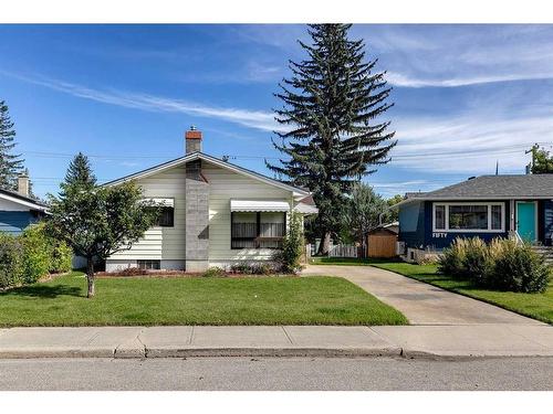 48 Malibou Road Sw, Calgary, AB - Outdoor With Facade