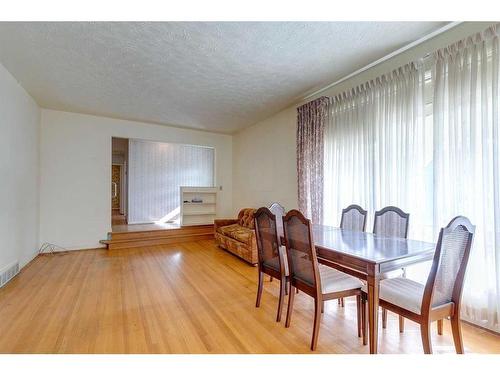 48 Malibou Road Sw, Calgary, AB - Indoor Photo Showing Dining Room