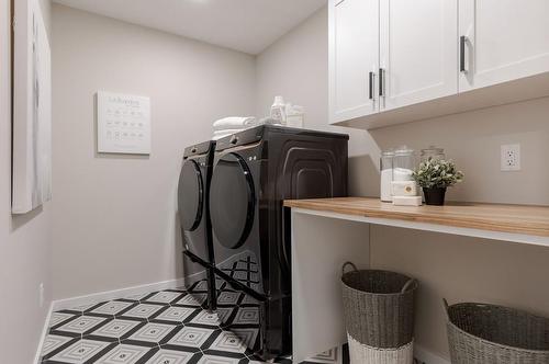 55 Mallard Heath Se, Calgary, AB - Indoor Photo Showing Laundry Room