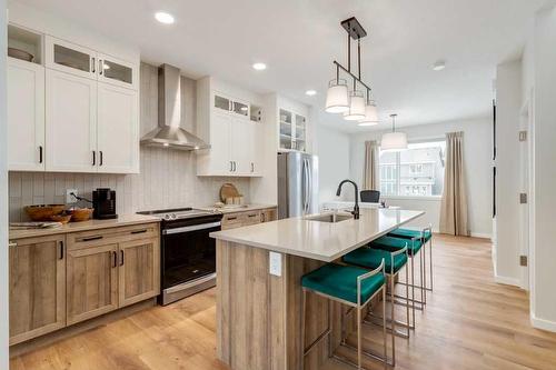 367 Sora Boulevard Se, Calgary, AB - Indoor Photo Showing Kitchen With Upgraded Kitchen