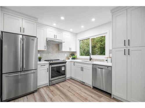 9836 Alcott Road Se, Calgary, AB - Indoor Photo Showing Kitchen With Stainless Steel Kitchen With Upgraded Kitchen