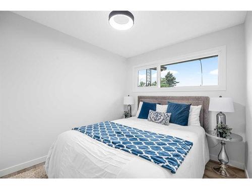 9836 Alcott Road Se, Calgary, AB - Indoor Photo Showing Bedroom