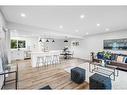 9836 Alcott Road Se, Calgary, AB  - Indoor Photo Showing Living Room 