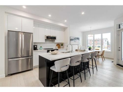 71 Greenbriar Place Nw, Calgary, AB - Indoor Photo Showing Kitchen With Stainless Steel Kitchen With Double Sink With Upgraded Kitchen