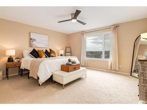 72 Sunset Close, Cochrane, AB - Indoor Photo Showing Bedroom