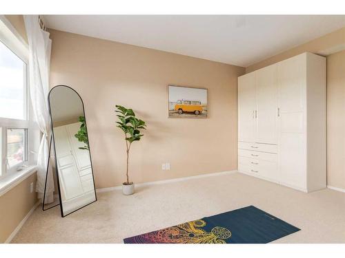 72 Sunset Close, Cochrane, AB - Indoor Photo Showing Other Room