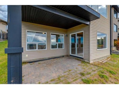 72 Sunset Close, Cochrane, AB - Outdoor With Deck Patio Veranda With Exterior