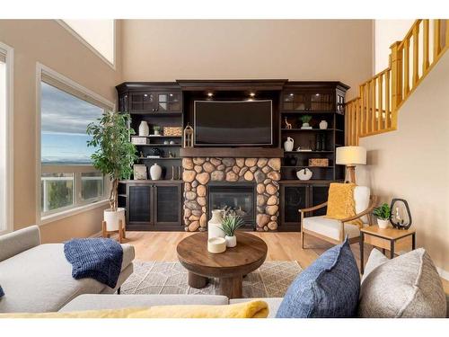 72 Sunset Close, Cochrane, AB - Indoor Photo Showing Living Room With Fireplace