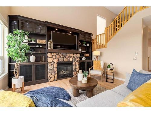 72 Sunset Close, Cochrane, AB - Indoor Photo Showing Living Room With Fireplace