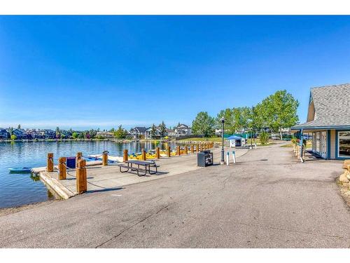 106 Chapalina Square Se, Calgary, AB - Outdoor With Body Of Water