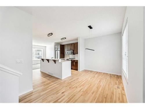 106 Chapalina Square Se, Calgary, AB - Indoor Photo Showing Kitchen