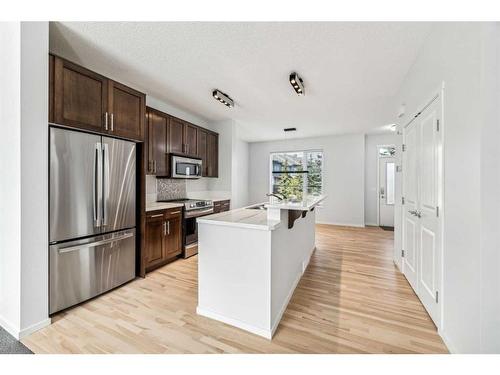 106 Chapalina Square Se, Calgary, AB - Indoor Photo Showing Kitchen With Stainless Steel Kitchen