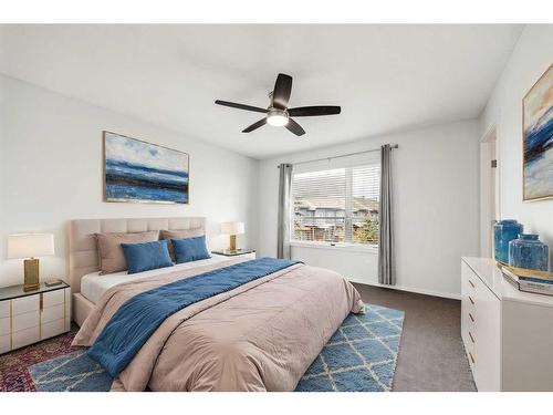 106 Chapalina Square Se, Calgary, AB - Indoor Photo Showing Bedroom