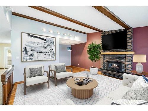 10023 Oakmoor Way Sw, Calgary, AB - Indoor Photo Showing Living Room With Fireplace