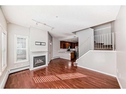 105-112 14 Avenue Se, Calgary, AB - Indoor With Fireplace