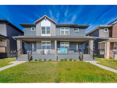 831 Creekside Boulevard Sw, Calgary, AB - Outdoor With Deck Patio Veranda With Facade