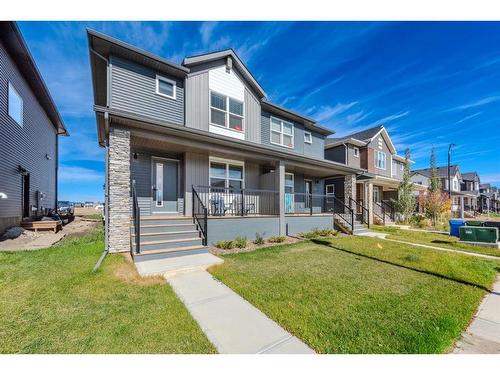 831 Creekside Boulevard Sw, Calgary, AB - Outdoor With Deck Patio Veranda With Facade